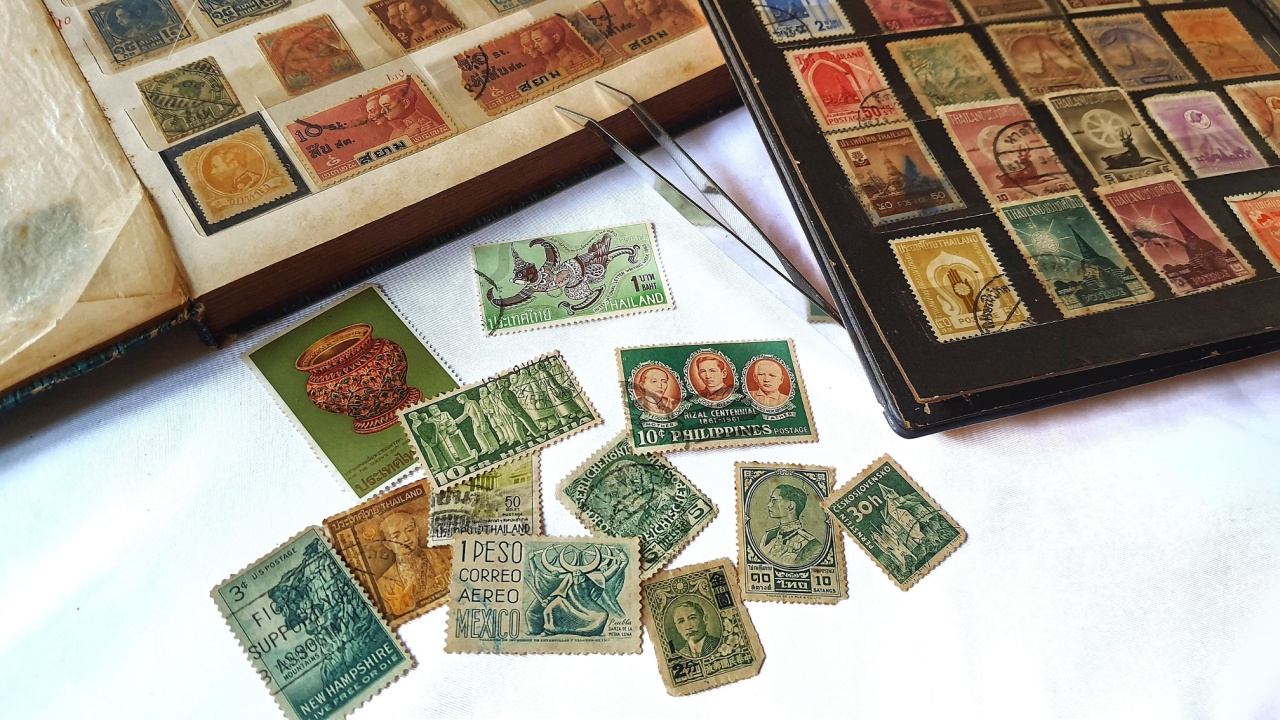 A colorful collection of postage stamps and different countries ,close up on old Stamp collecting book.