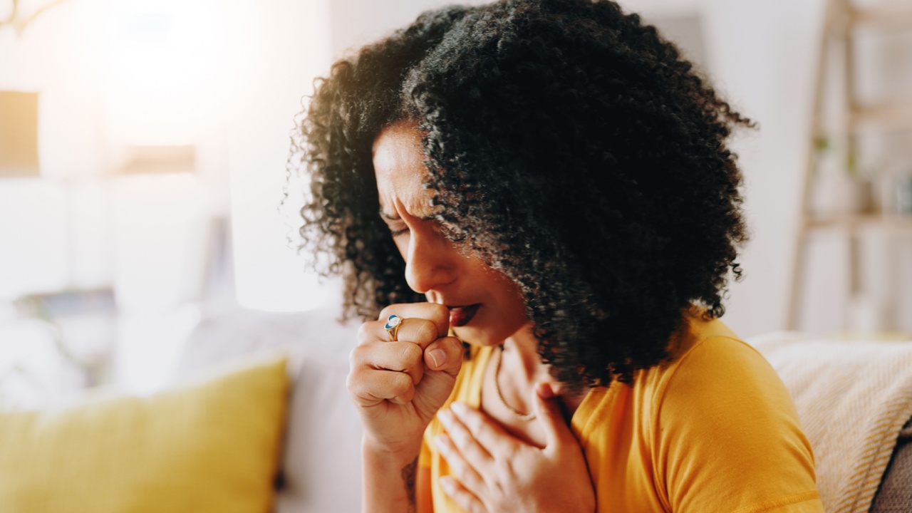 Home, sick and woman with chest pain, cough with asthma.