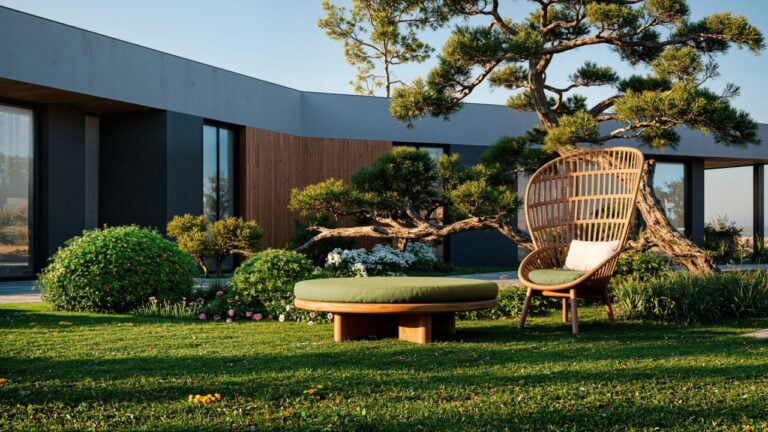 Modern house with landscaped garden, decorative trees and outdoor seating area in minimalist design.