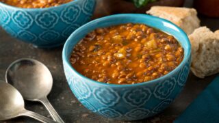 A bowl of delicious hearty homemade curried lentil soup.