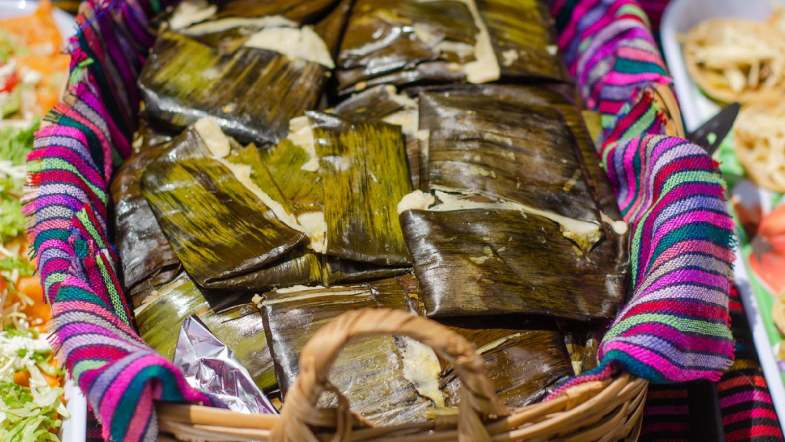 Traditional Mexican chicken Tamales covered with banana sheets