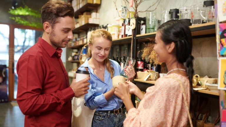 group of young friends shopping antiques thrift store