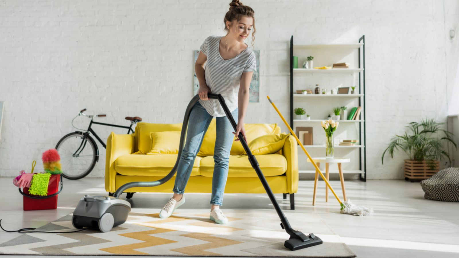 happy woman cleaning vacuuming carpet floor clean house