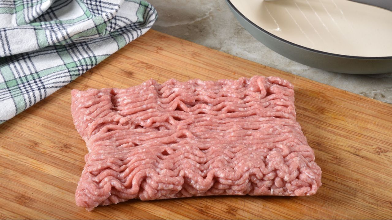 A pound of natural organic ground turkey on a cutting board