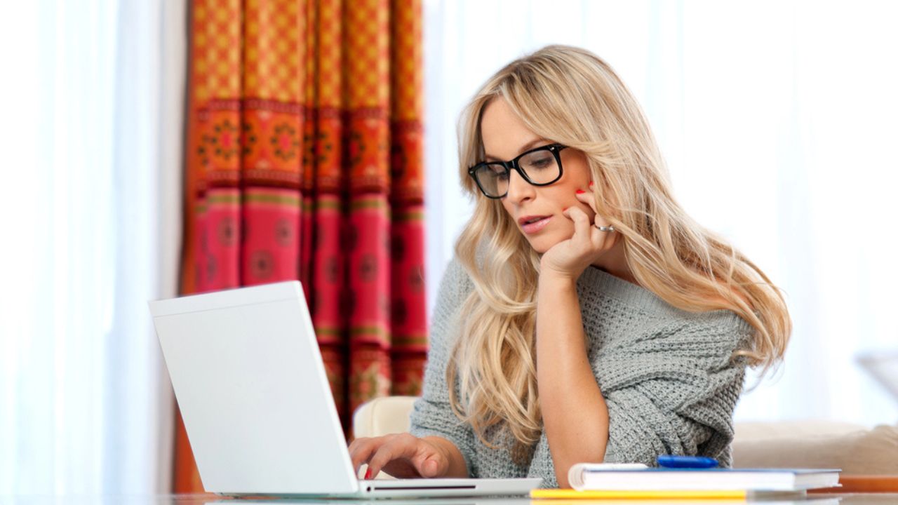 Attractive adult woman with laptop