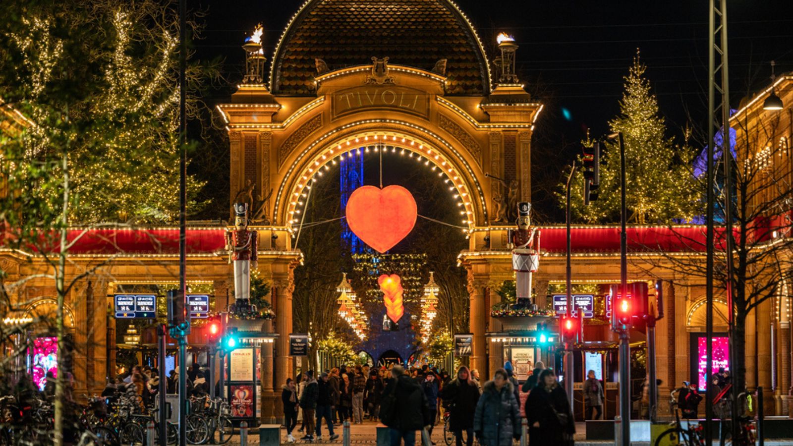 Copenhagen, Denmark The entrance to the Tivoli Gardens amusement park at night.