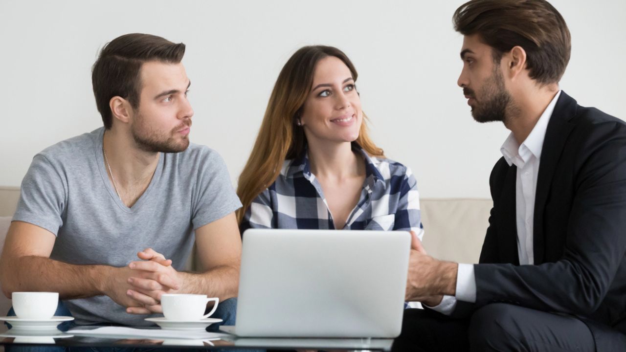 Couple customers renters tenants consulting realtor lawyer or landlord