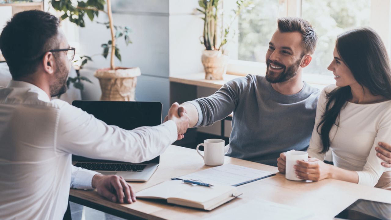 Couple talking to a consultant