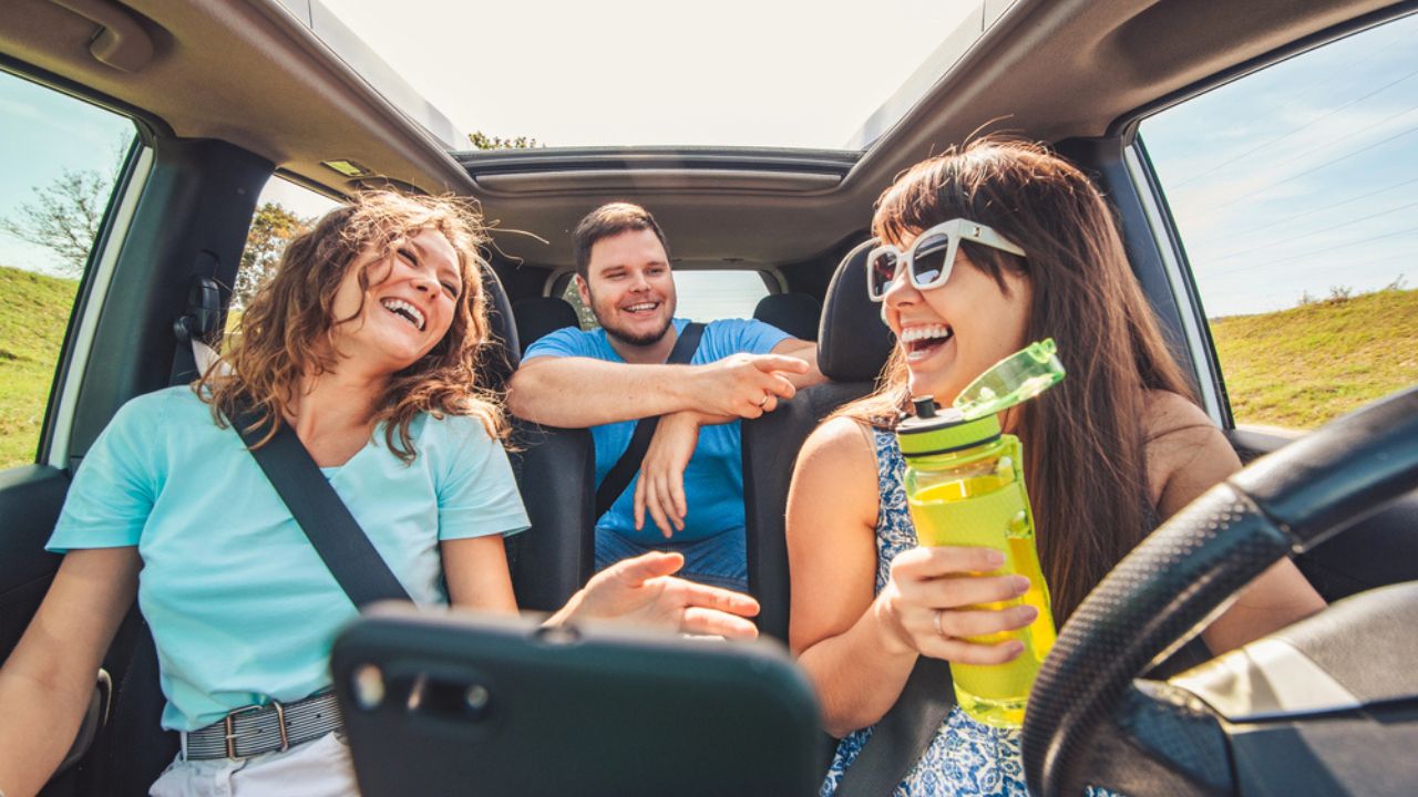 Group of people travel by car. road trip concept. view inside