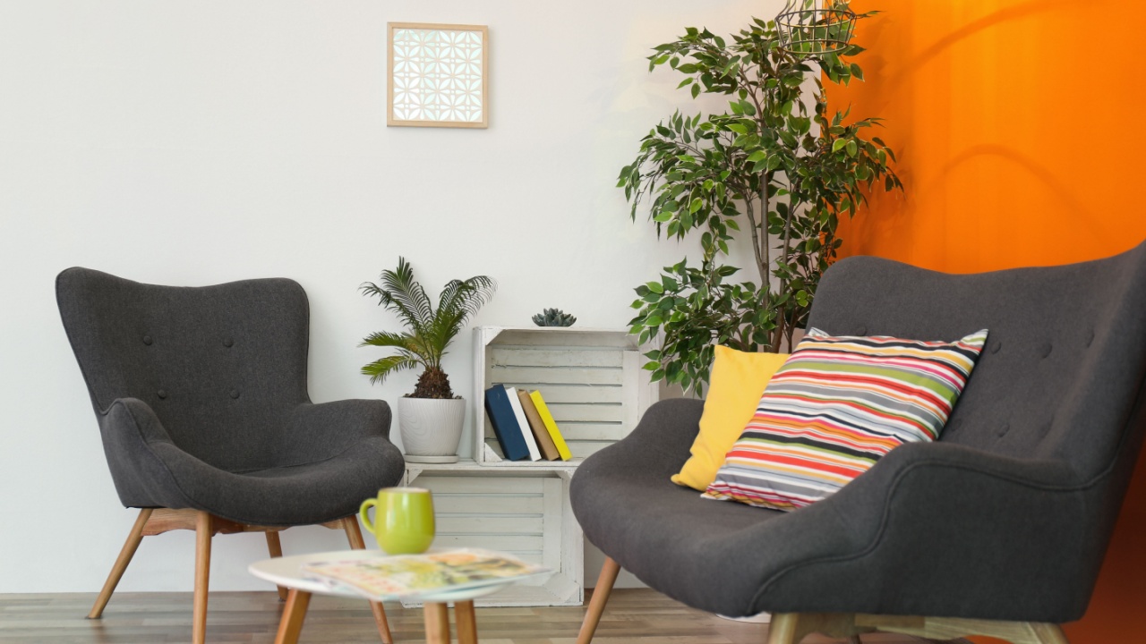 Interior of modern living room with pillows on sofa