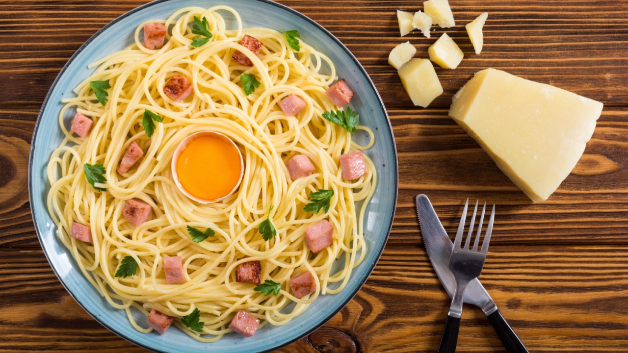 Itslian pasta carbonara with sausage and egg . Spaghetti food background