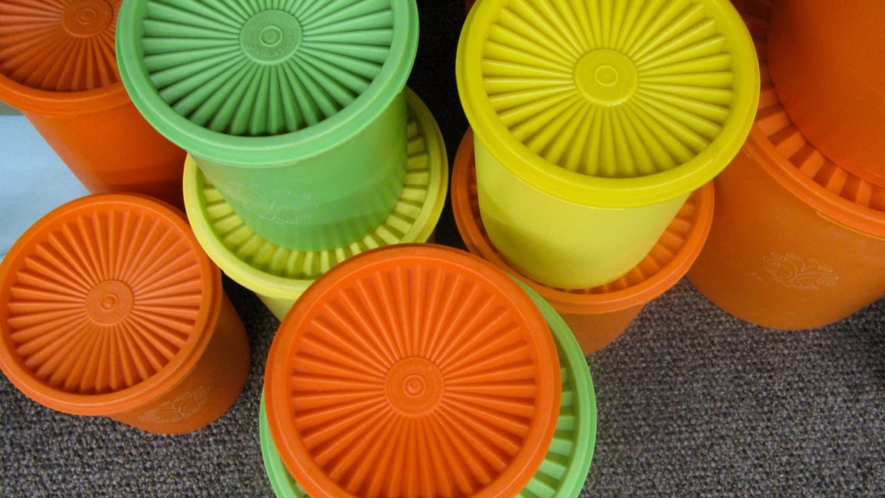 Tucson, Arizona, USA&ndash;July 27, 2019: A colorful display of vintage plastic Tupperware food storage canisters beckons collectors at a local antique mall.