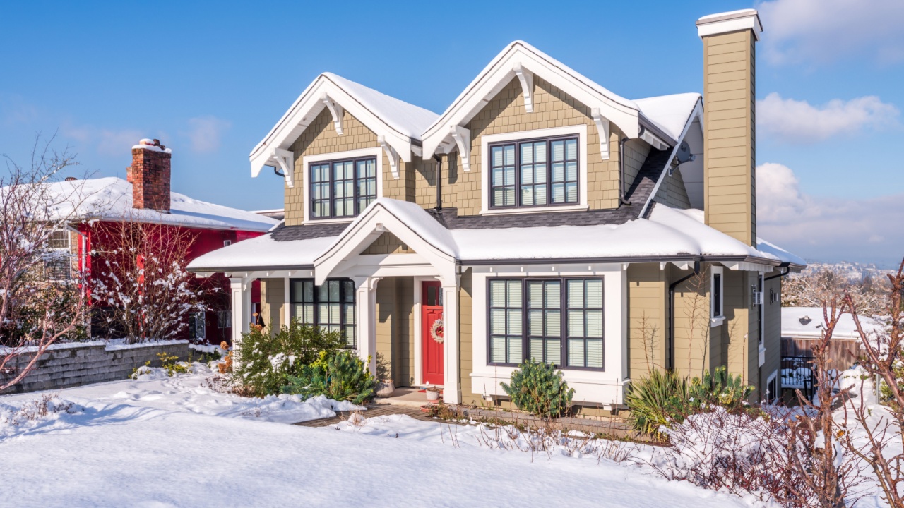 A perfect neighbourhood. Houses in suburb at Winter in the north America. Luxury houses covered nice snow.