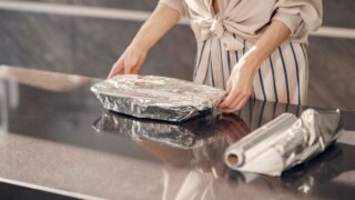 Woman working at home. Mother on quarantine. Lady make a dinner