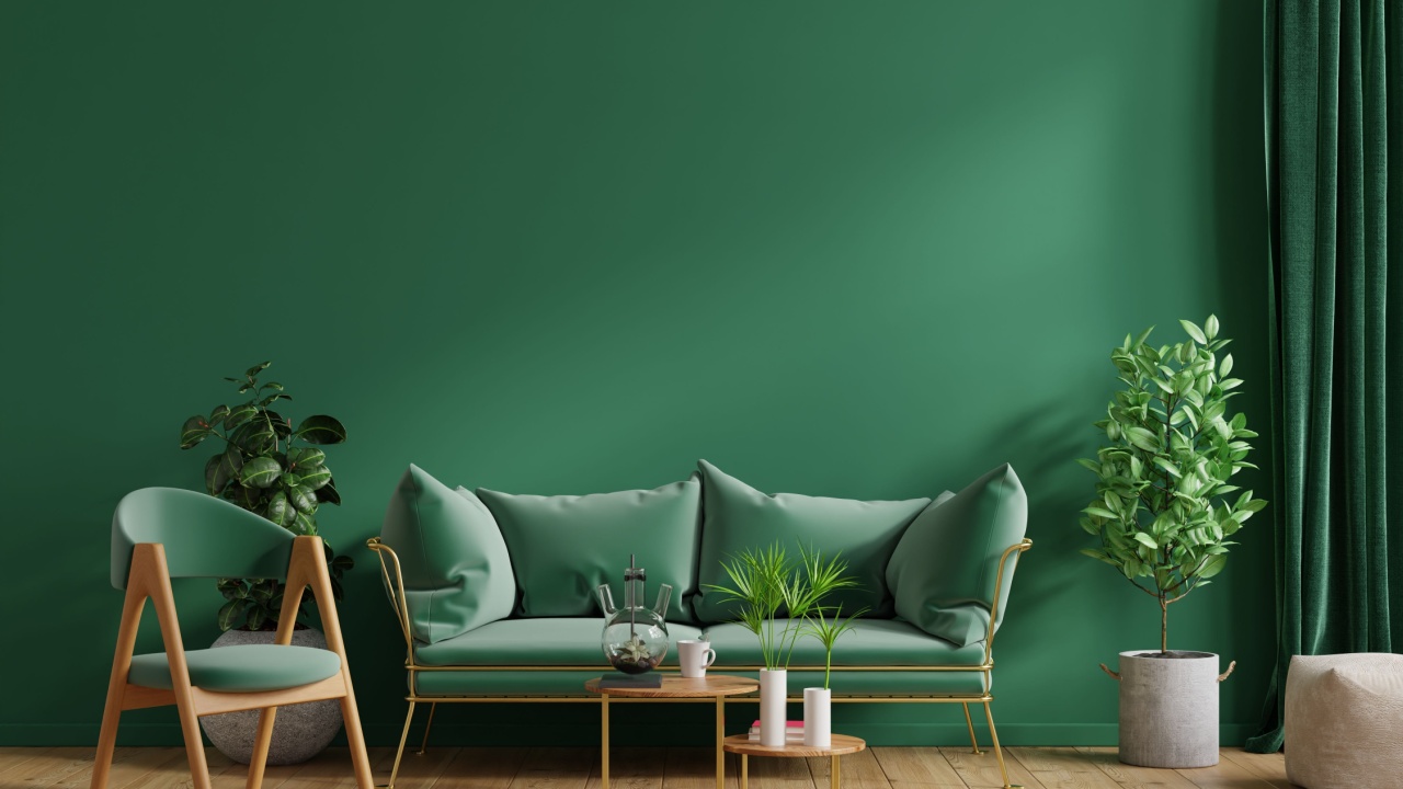 Interior mockup green wall with green sofa and green armchair in living room,3D rendering