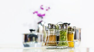 Powder spices in glass bottle jar