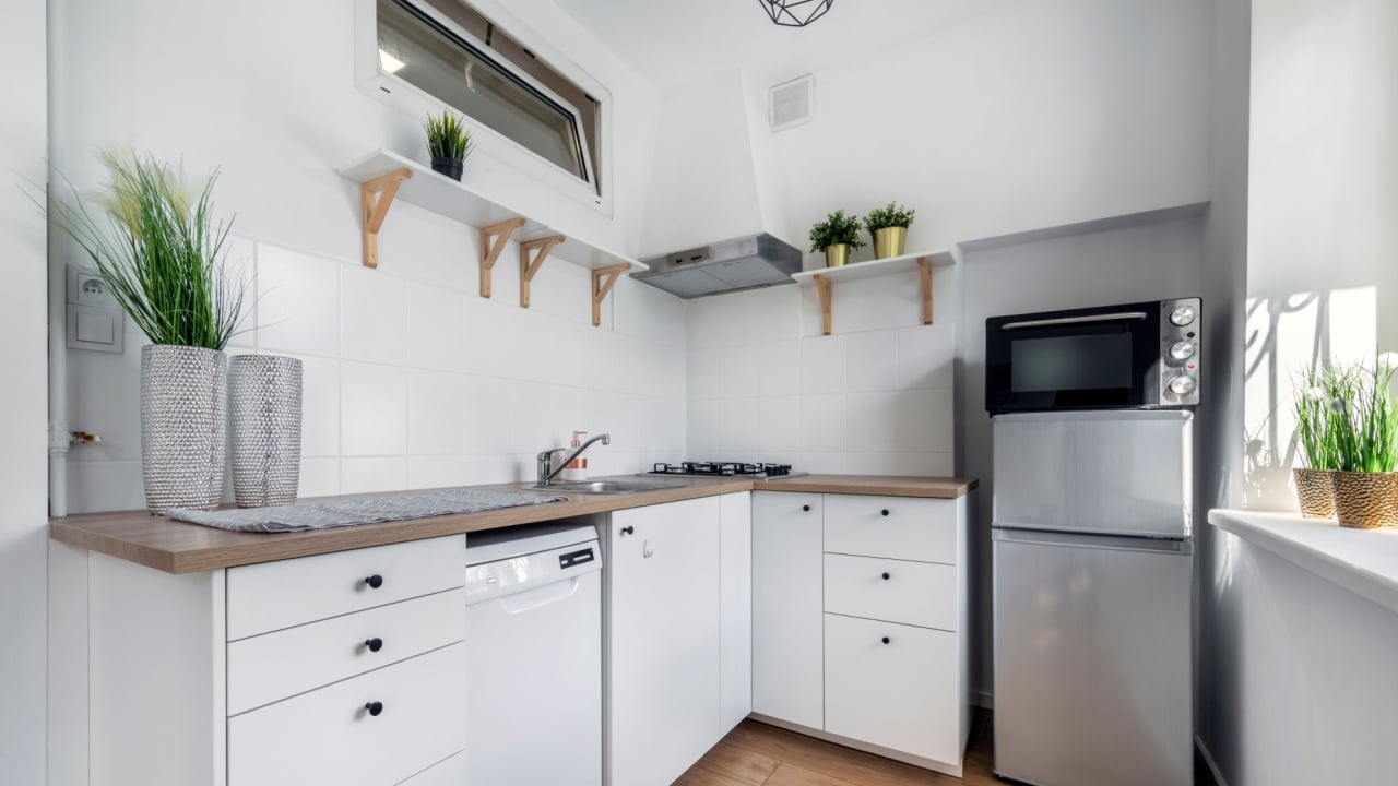 Small kitchen in white finishing - moder interior design