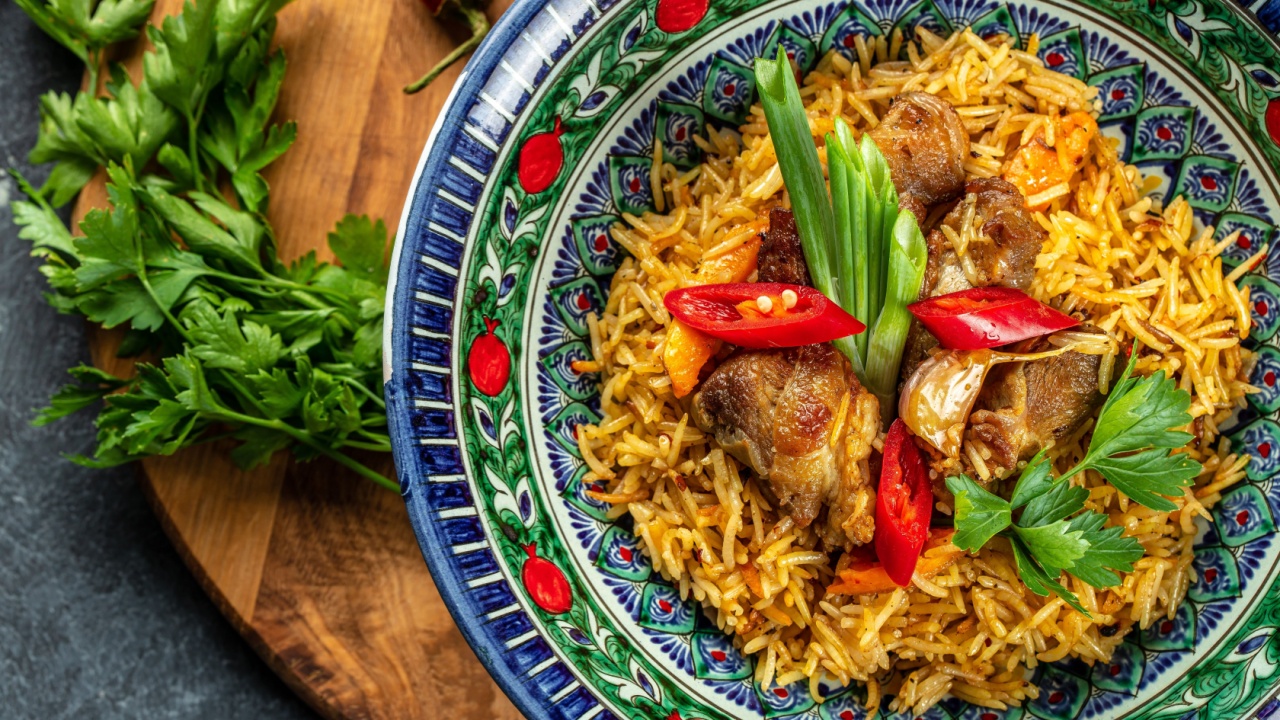 Uzbek pilaf or plov from lamb. Restaurant menu, dieting, cookbook recipe top view.
