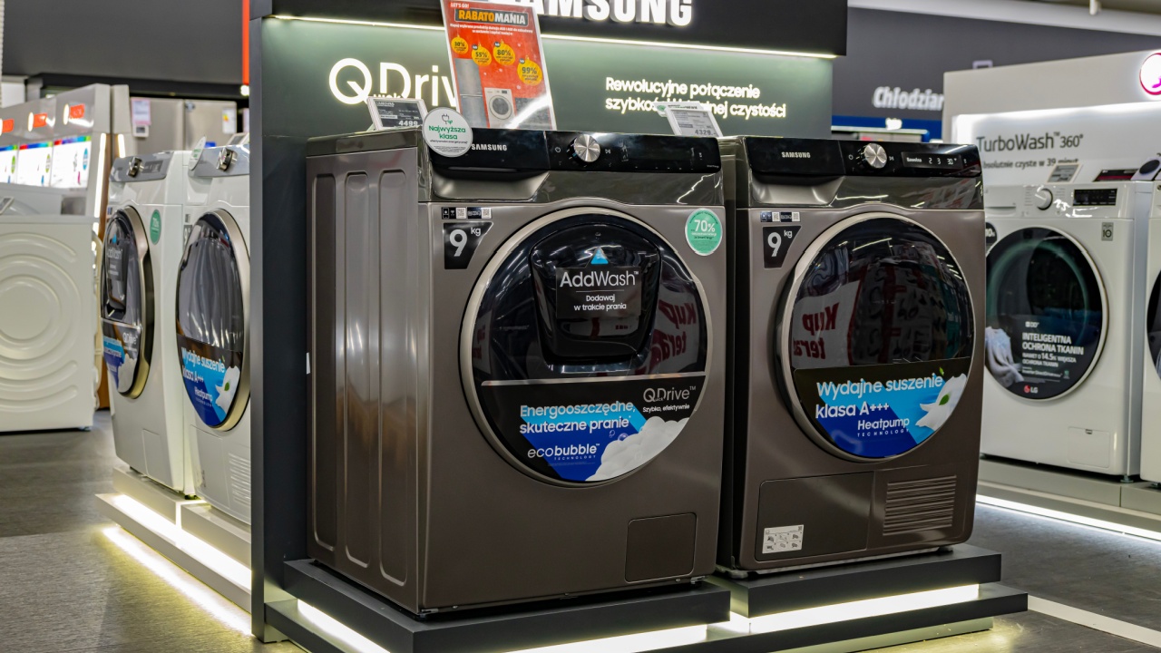 POZNAN, POL - DEC 8, 2023: Front-loader washing machines by Samsung put up for sale in a household goods store