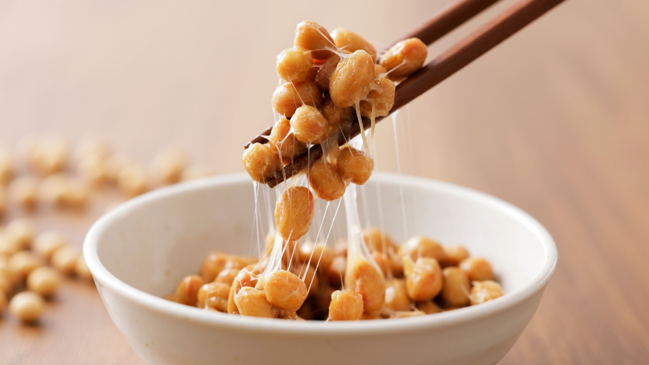 Japanese natto lifted with chopstick