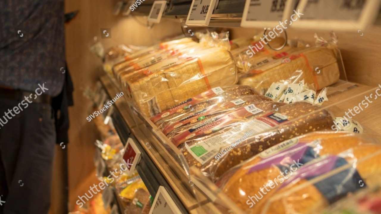 Copenhagen, Denmark - September 12 2024: bread shelf in the supermarket. Various brands of Nordic breads in the bakery aisle inside the grocery store