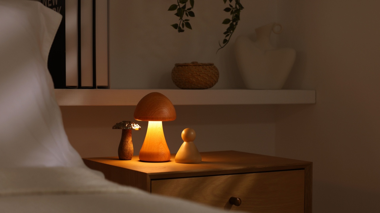 Stylish living room interior with bed, bedside table and night light