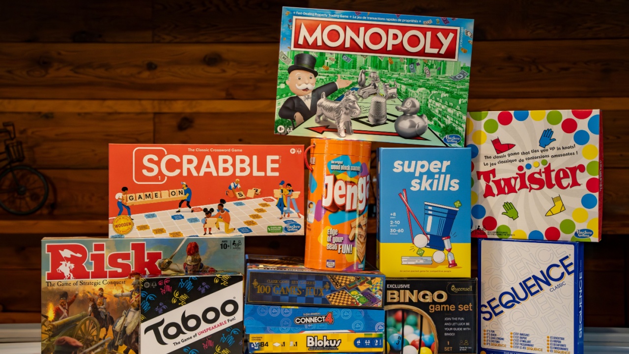 Popular board games on an air hockey table. Toronto, Canada - October 11, 2024.