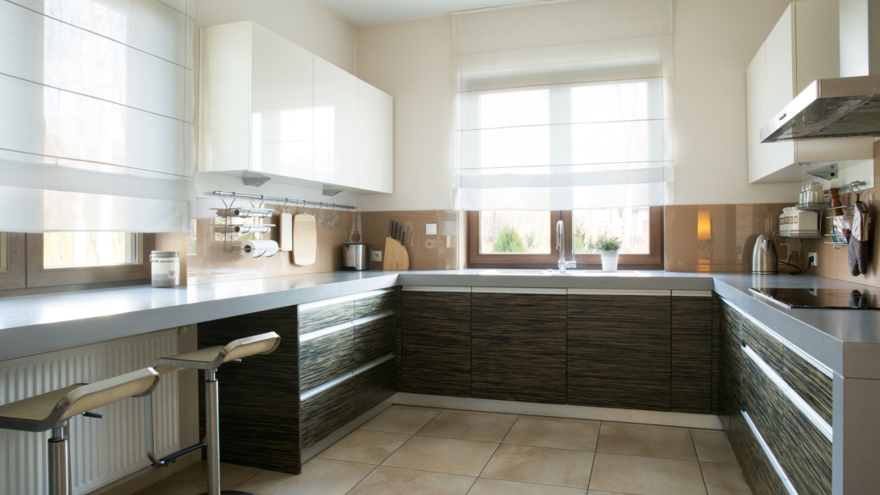 Spacious kitchen with window in modern apartment