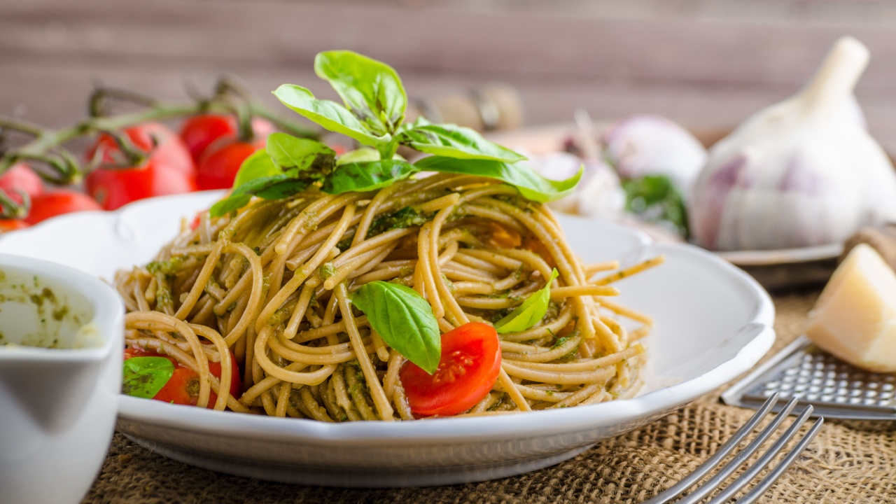 Pasta with Milan pesto - basil with nuts and permesan, garlic and olive oil, delicious and genial food.