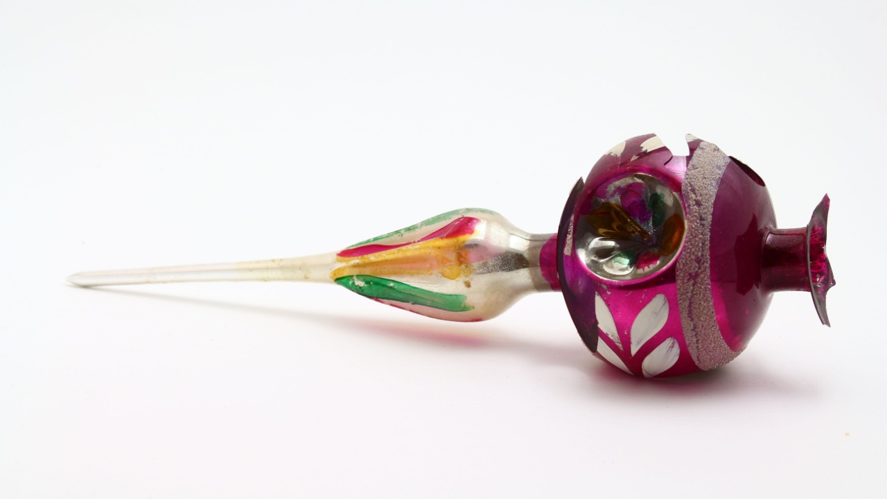 Vintage antique broken glass Christmas tree topper from the 1960s