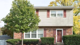 Small Two Story House with Front Crabapple Tree