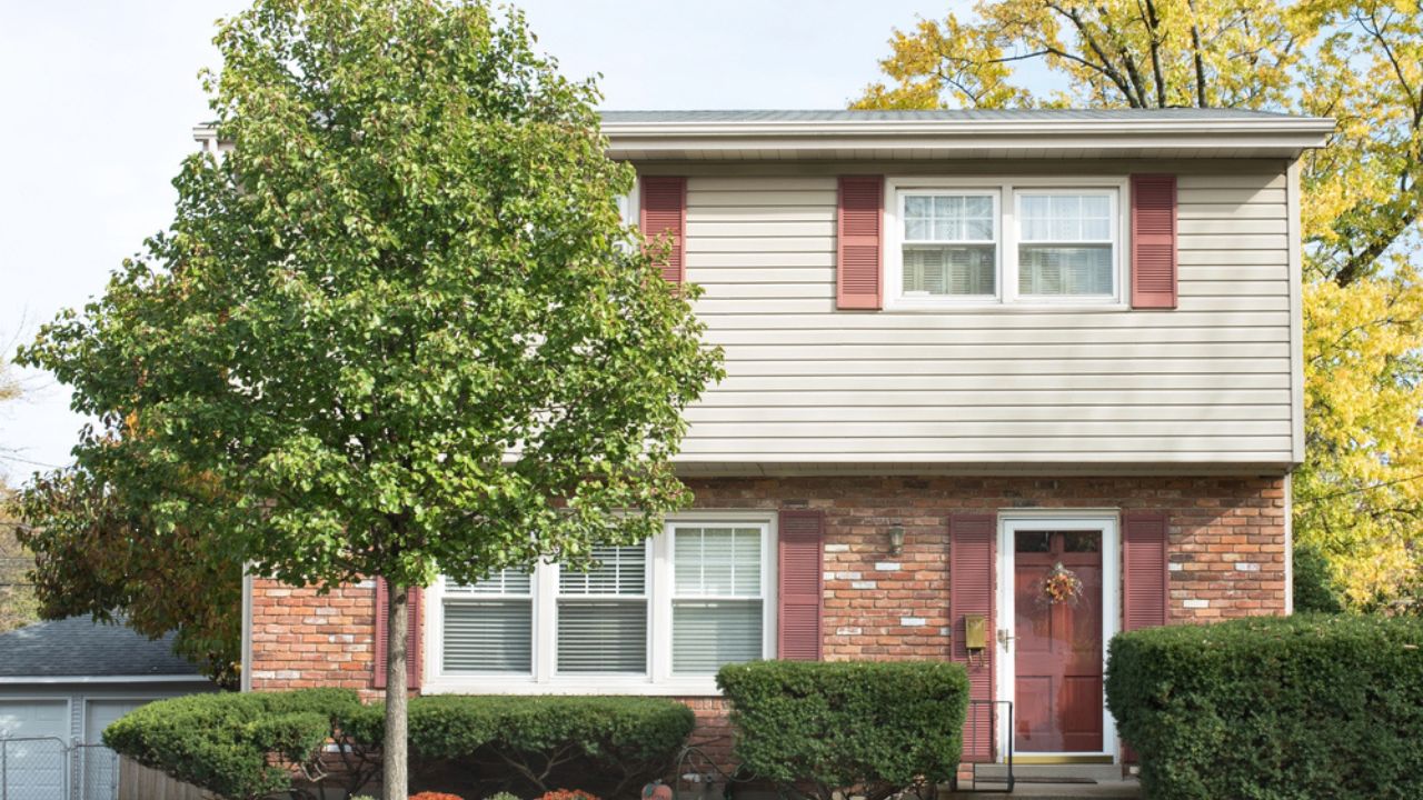 Small Two Story House with Front Crabapple Tree