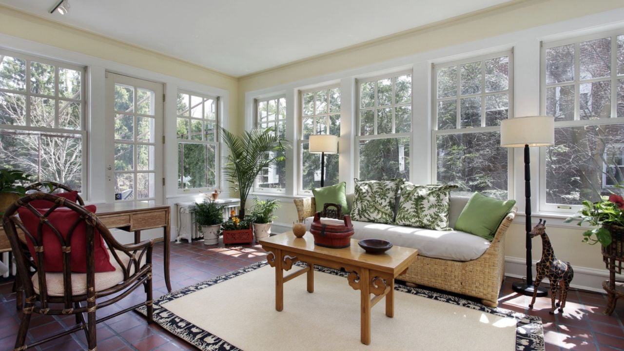 Sunroom with red brick flooring