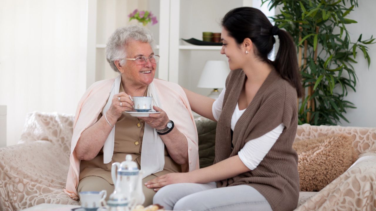 Women sitting on the sofa and talking