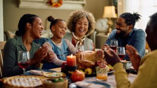a family around the Thanksgiving table