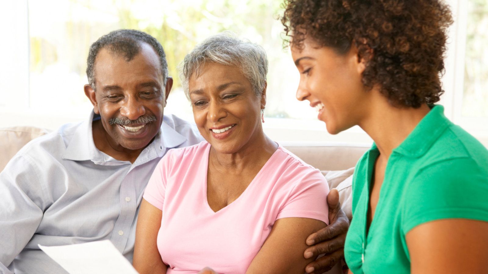 senior retired elderly couple talking to daughter about home budget finances