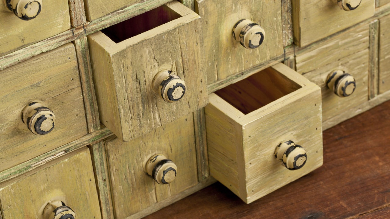 drawers of primitive vintage grunge wood apothecary cabinet