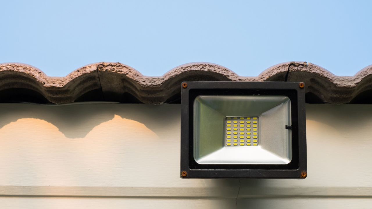 LED flood light, spot light on the roof with blue sky background