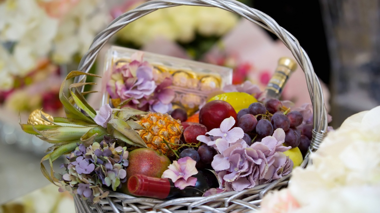 A holiday gift box with decorative flowers