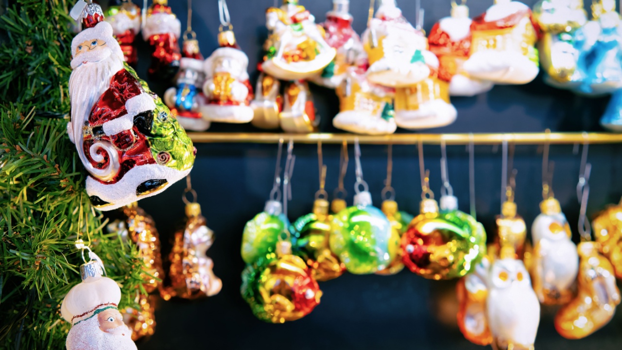 Berlin, Germany - December 8, 2017: Glass Christmas Tree Decorations at Night Market in Gendarmenmarkt in Winter Berlin, Germany. Advent Fair and Bazaar Stalls with Craft Items.