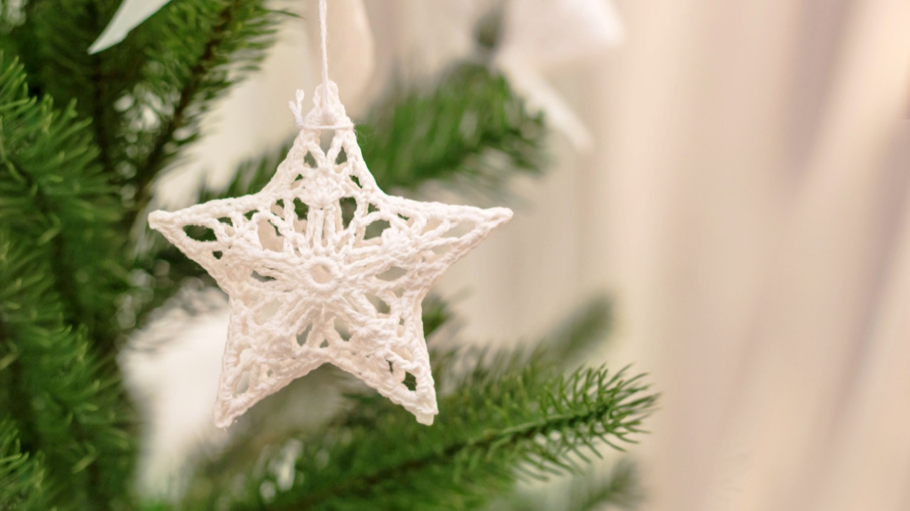 Christmas tree with toys and decorative snow for a happy new year.