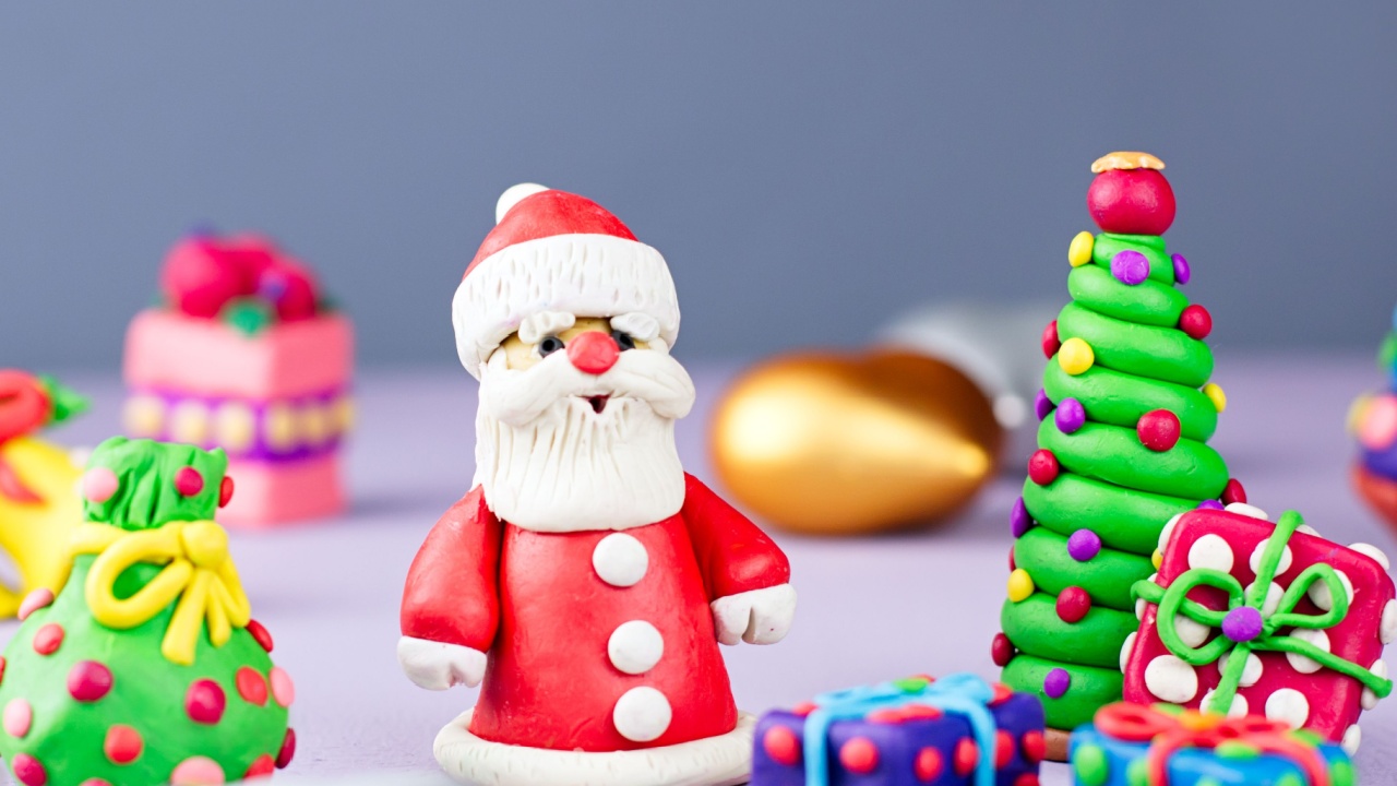 Christmas background with decorations. Santa, Christmas train with tree and sweets, snowman, reindeer and gifts