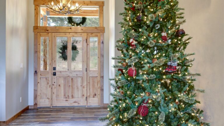 Beautifully decorated Christmas tree in a new luxury house.
