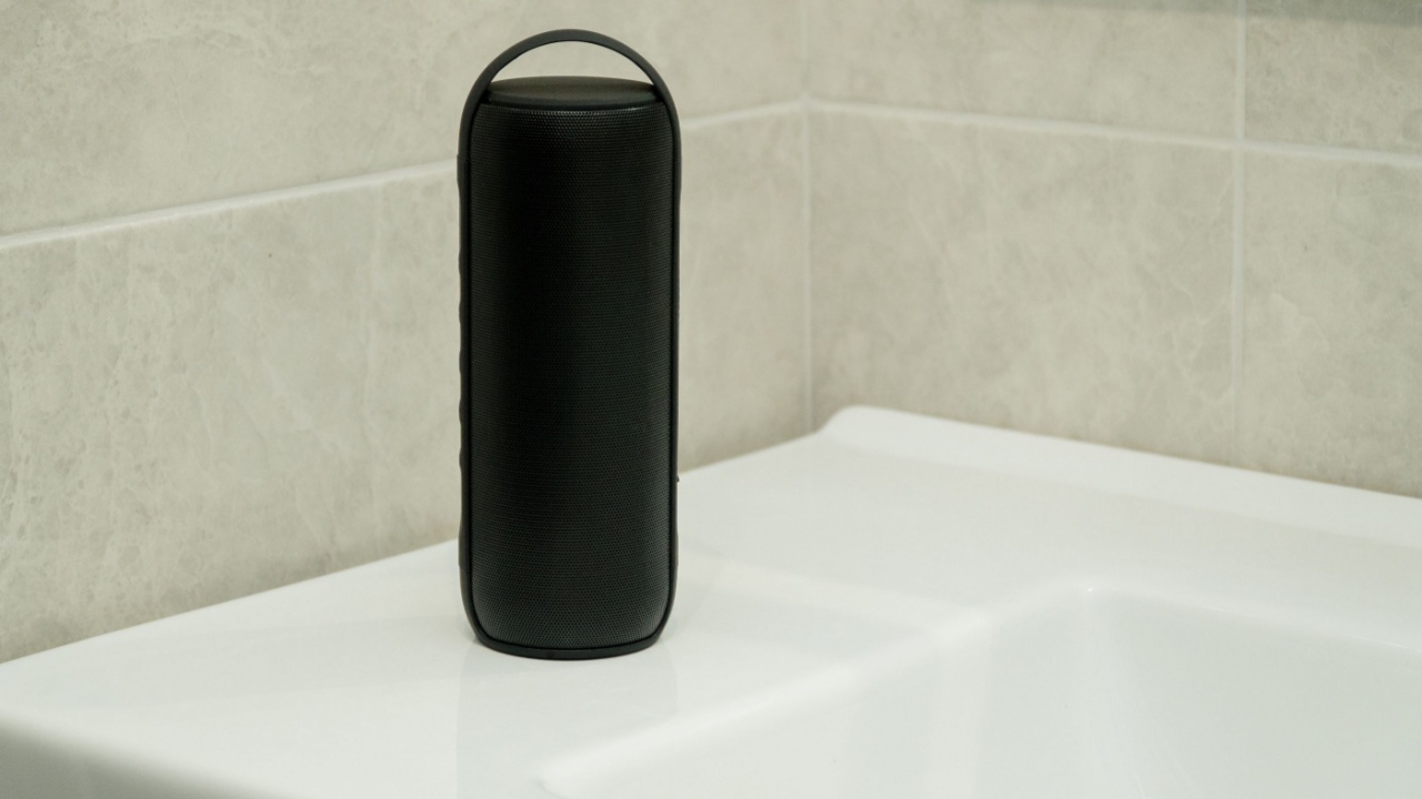 Bluetooth speaker plays music in a bathroom