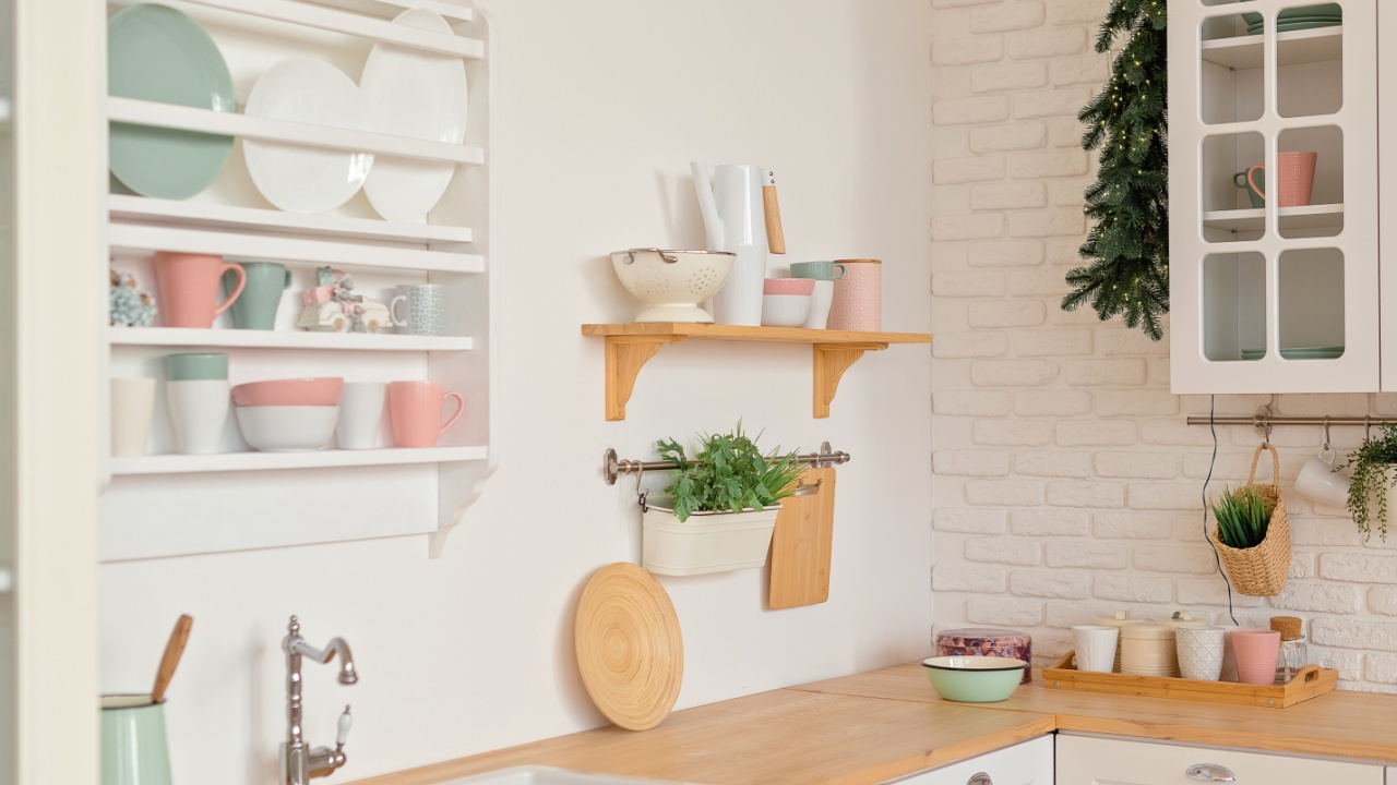 Modern kitchen with shelves, food, spice and dishes.