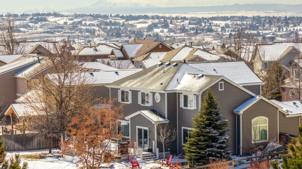 Colorado Living. Centennial, Colorado - Denver Metro Area Residential Winter Panorama with the view of a Front Range mountains on the distance