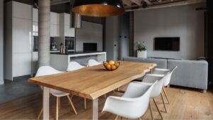 Industrial home interior with wooden ceiling and black pendant lamp