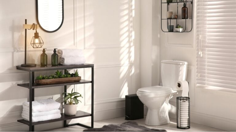 Modern toilet bowl in comfortable restroom. Interior design