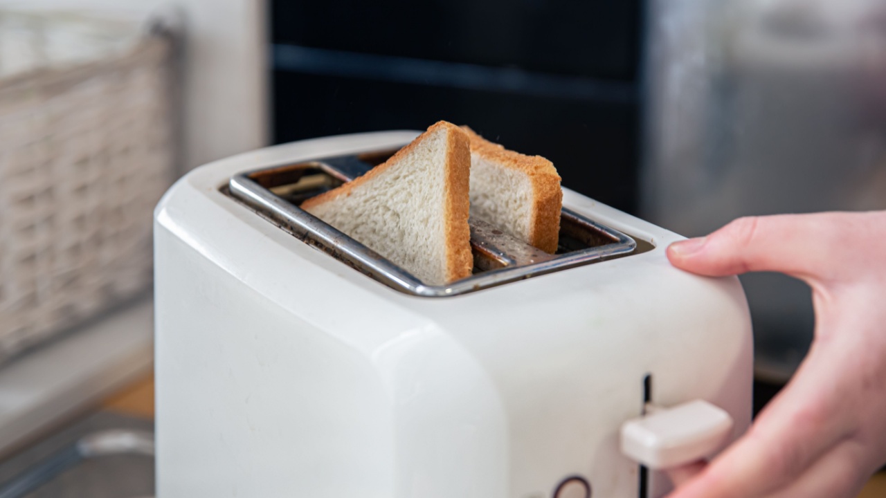 Close-up of slices of bread in a toaster.