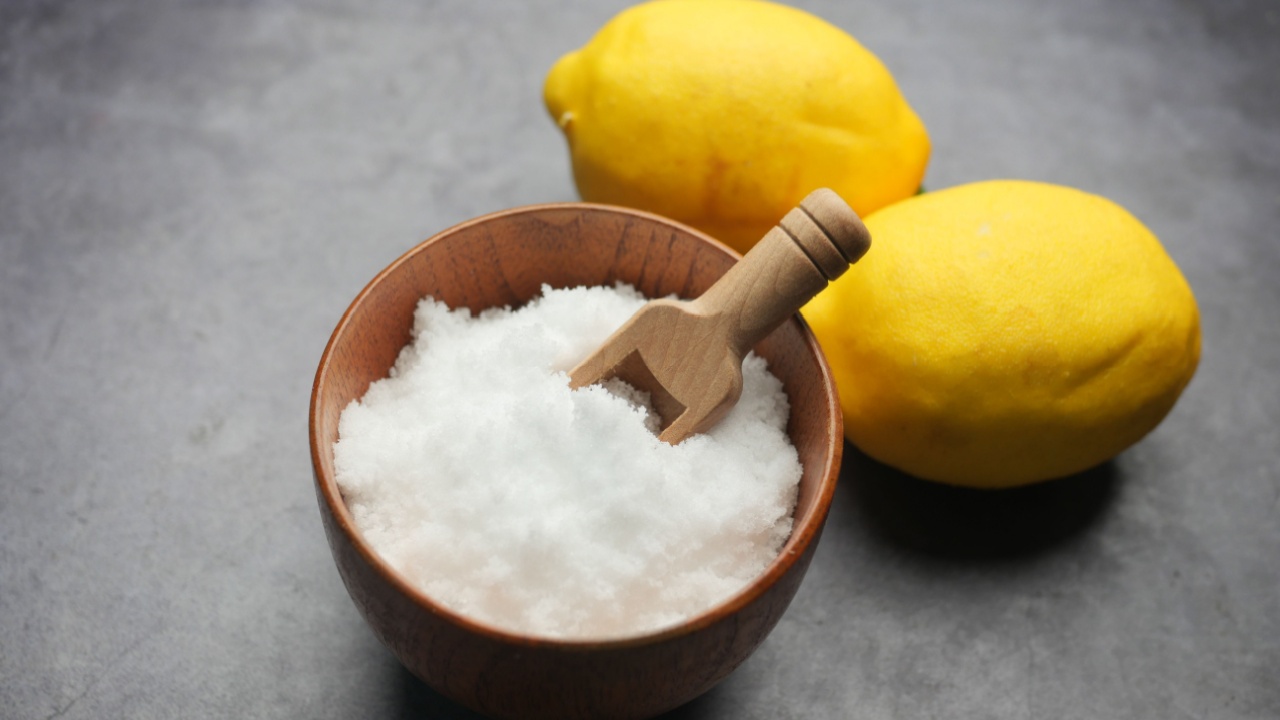 Coarse salt in a bowl on table